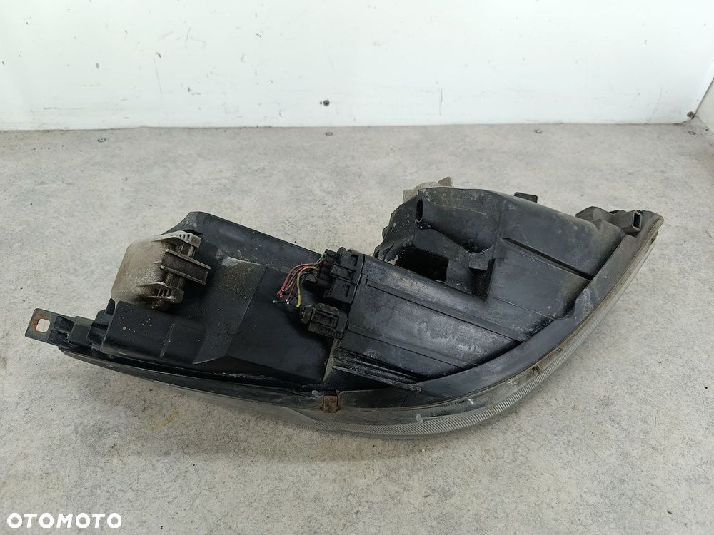 LAMPA PRZÓD LEWA MITSUBISHI COLT VI 8301A993 0301208221 - 9