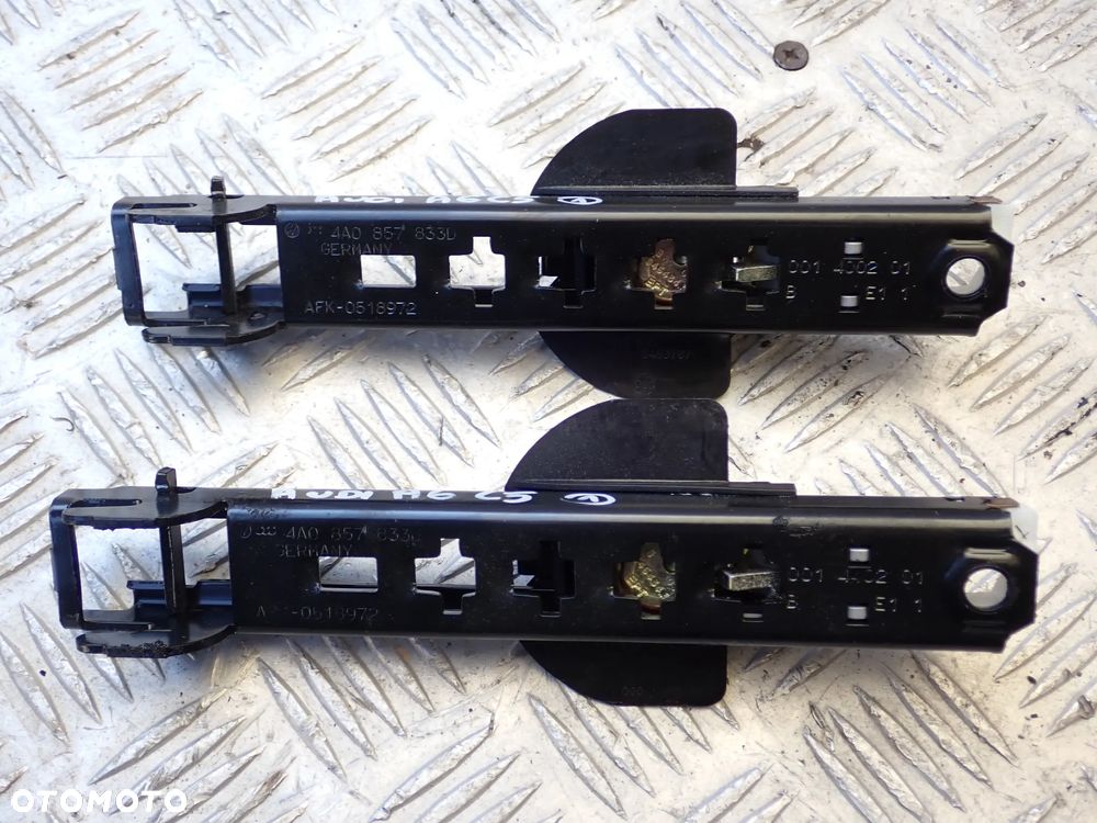 AUDI A6 C5 CZĘŚCI (1)- 4A0857833D, 8E0/1J0864203 B/C/D, 4B9827507M, 4B0823509,4B9827085D, 4B1880204G, DZWIGNIA HAMULCA RĘCZNEGO, 4B9827552M, 4B0823359C, LINKA MASKI, 8L0035501E, 4B0959655P, 8E0909559H, (E8) 67R-016205, 4B0962258N, 8D0422373C, 4B0955453A,  RADIO +PANEL - 2