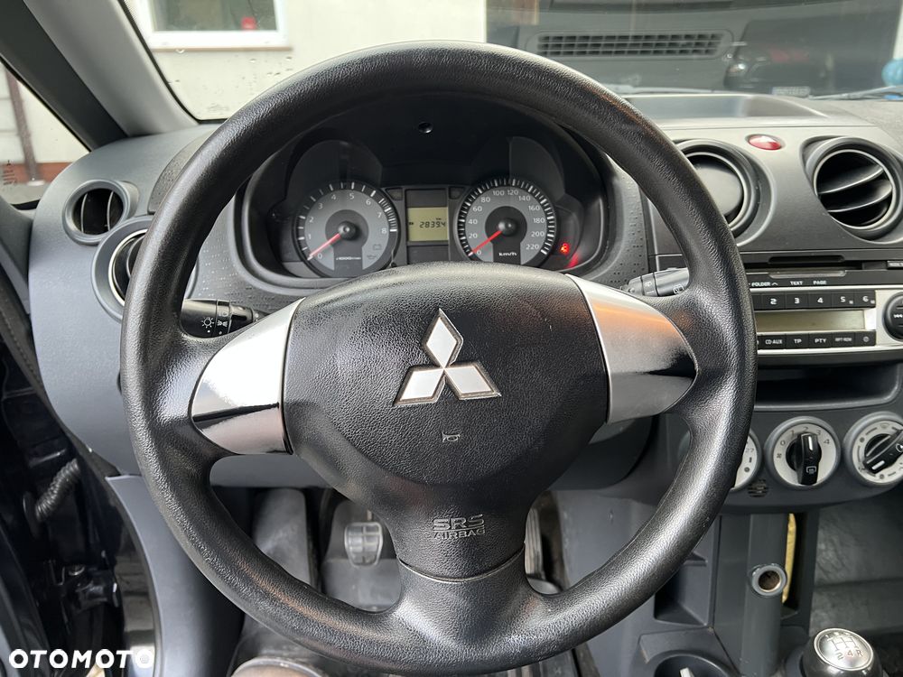 Mitsubishi Colt 1.1 - 13