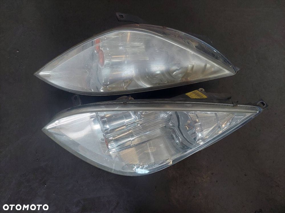 BŁOTNIK LEWY PRAWY PRZÓD + LAMPA LEWY PRAWY PRZÓD MITSUBISHI COLT VI 11H - 2