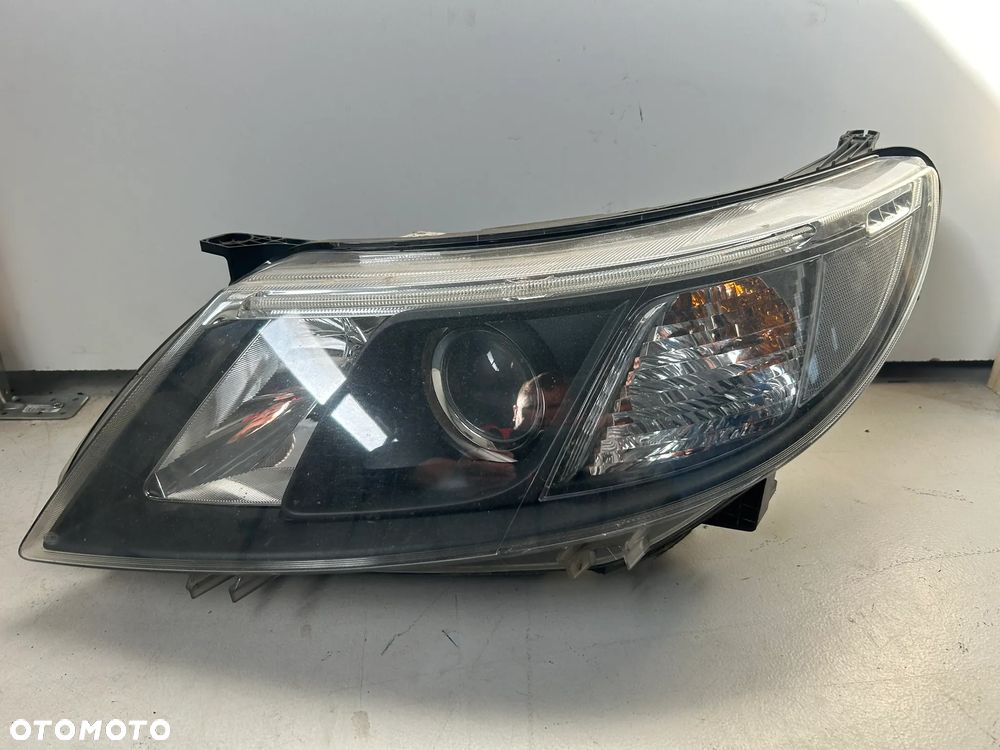 Saab 93 lampa lewa przednia Xenon Skrętny Europa 12842053 lift 2007-2012
