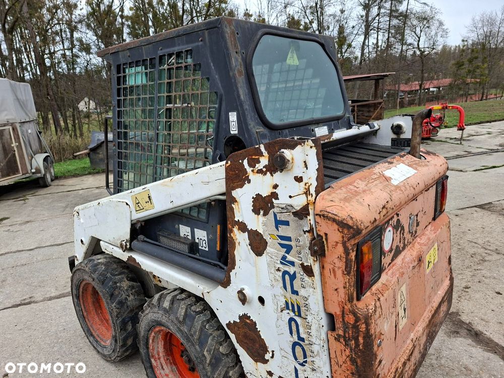 Bobcat 553 4X4 + Melroe Ingersoll-Rand 725S B/H - 31