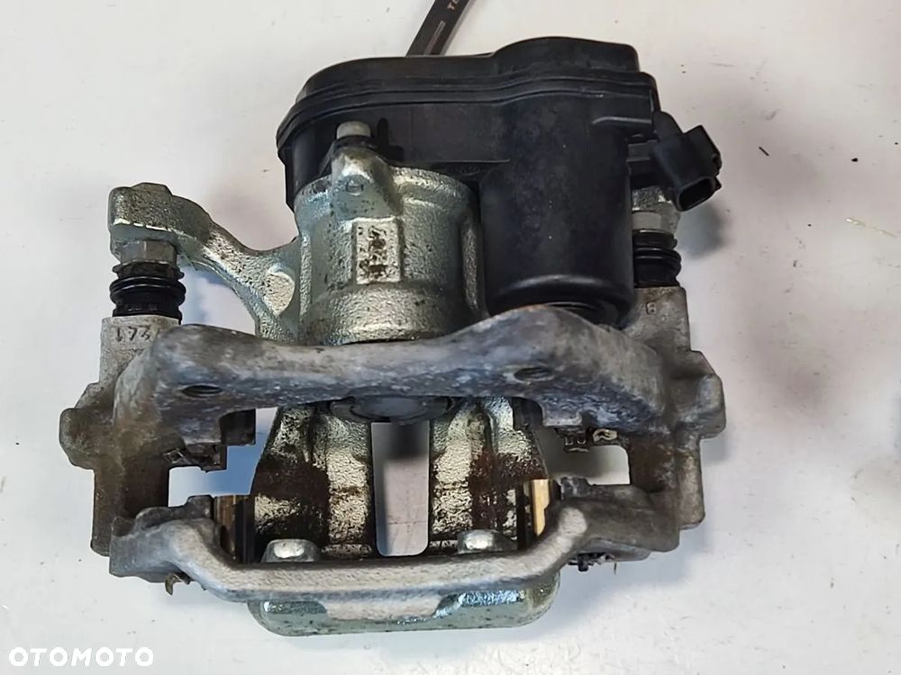 TOYOTA COROLLA E21 1.8h od 2022r Zacisk Hamulcowy Tył Prawy Lewy - 4