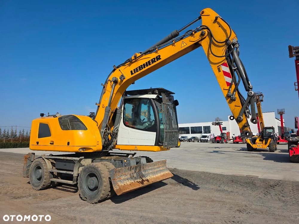 Liebherr A 914 Litronic jak TEREX CAT SENNEBOGEN M497 - 2