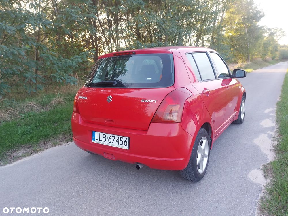 Suzuki Swift 1.3 Club - 8