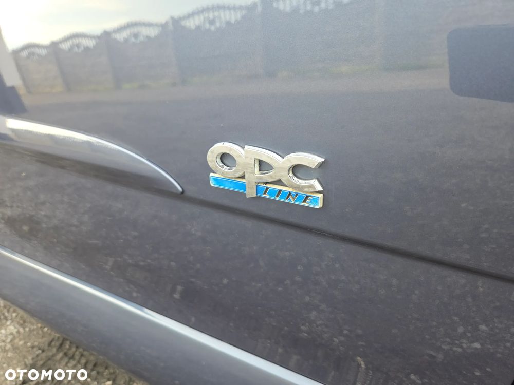 Opel Astra 1.8 Sport - 24