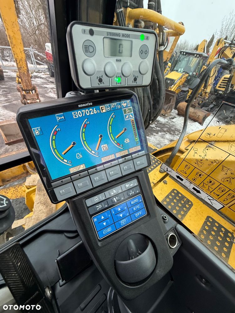 Komatsu PW118 - 5