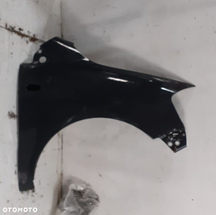 *Błotnik PRAWY   VOLKSWAGEN VW FOX LI7F CZARNY - 1