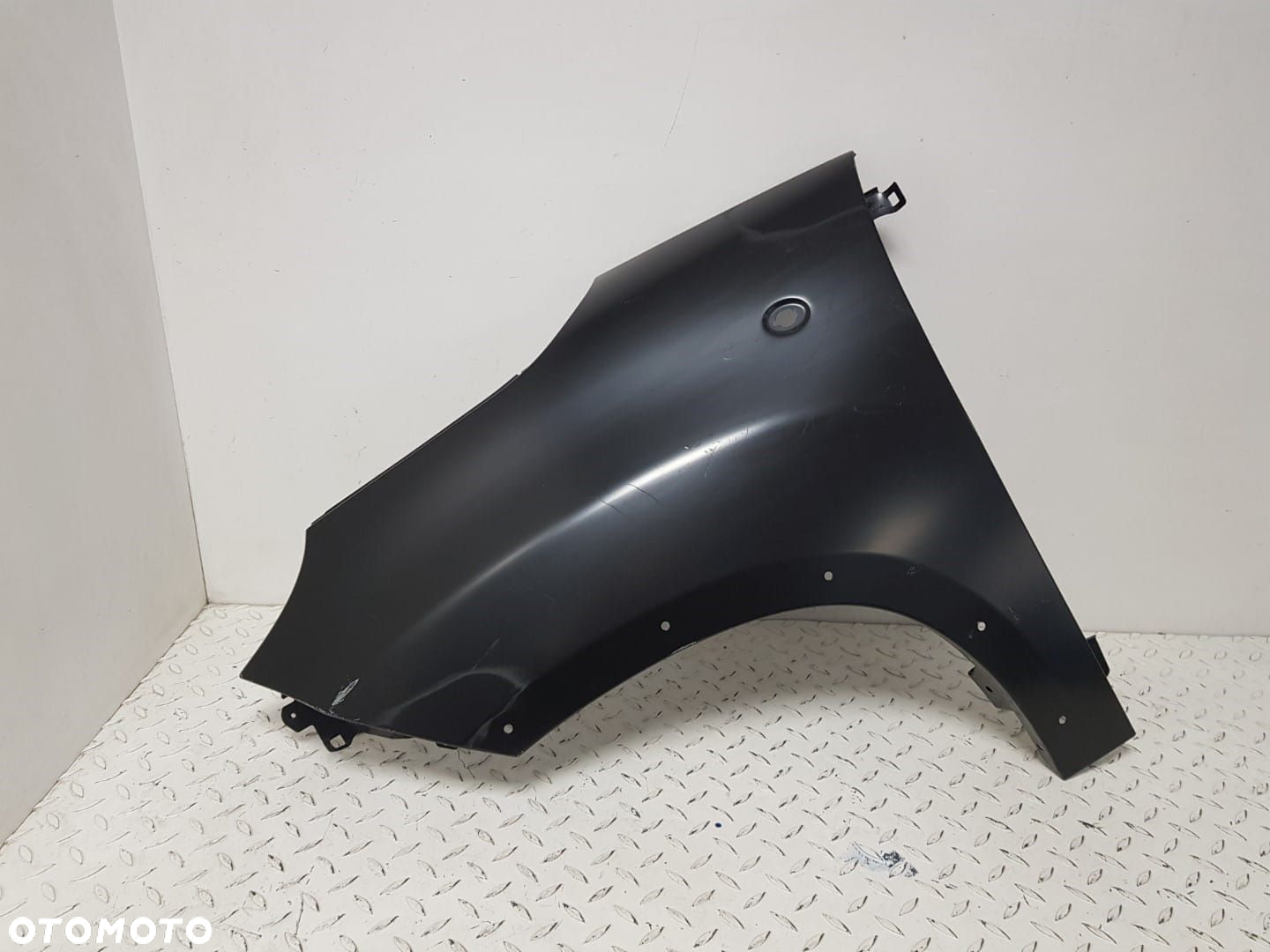 FABRYCZNIE NOWY ORYGINALNY BŁOTNIK LEWY LEWA FIAT 500L 12-22  16897869 - 2