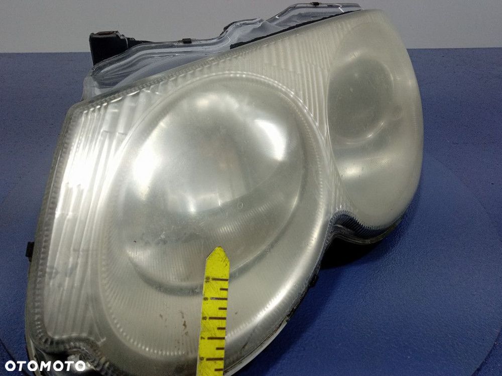 CHRYSLER 300M REFLEKTOR LEWY LAMPA EU 04780003AC - 5