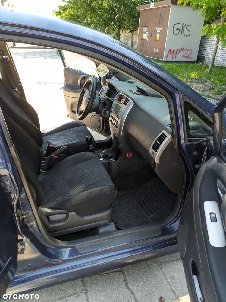 Suzuki Liana 1.4 D - 10