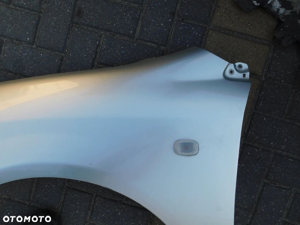 błotnik lewy przód TOYOTA COROLLA E12 HB  EU 1C0 - 5
