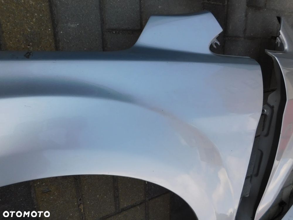 błotnik lewy przód FORD FOCUS II LIFT FL  03 - 3