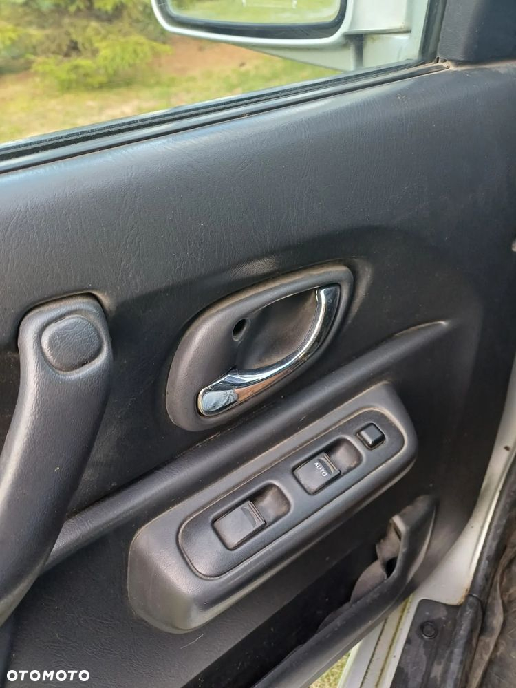 Suzuki Jimny 1.3 - 12