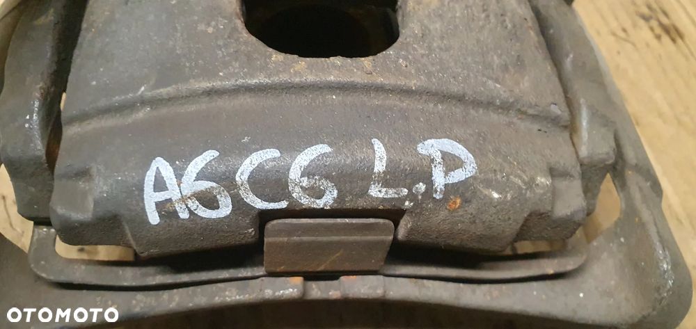 Zacisk hamulcowy lewy przód przedni Audi A6 C6 2.7 TDI - 7