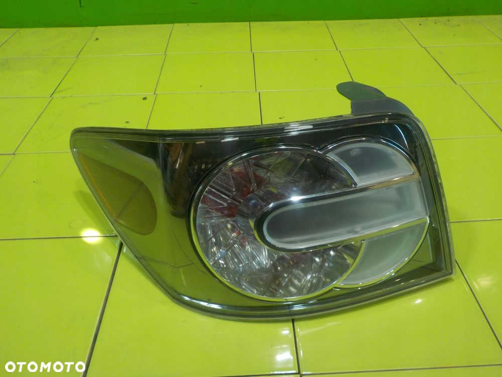 MAZDA CX-7 LIFT 2.2 D 09r lampa lewa tyl - 1