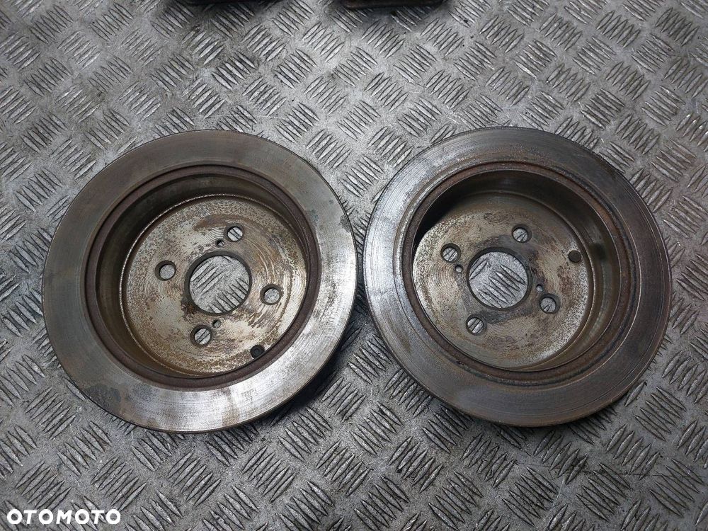 TARCZE HAMULCOWE TYŁ + ZACISKI TOYOTA COROLLA E12 1.6 16V - 3