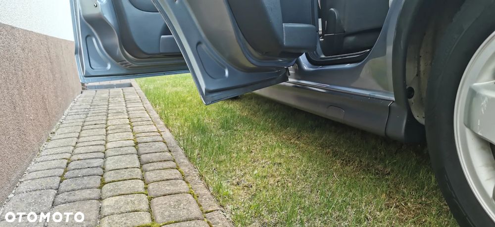 Opel Corsa 1.2 16V Enjoy - 24