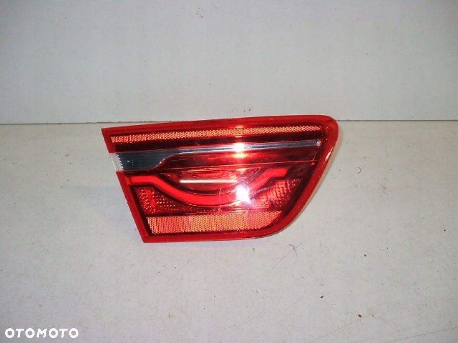JAGUAR XE X760 LAMPA TYŁ TYLNA lewa w klapę - 1