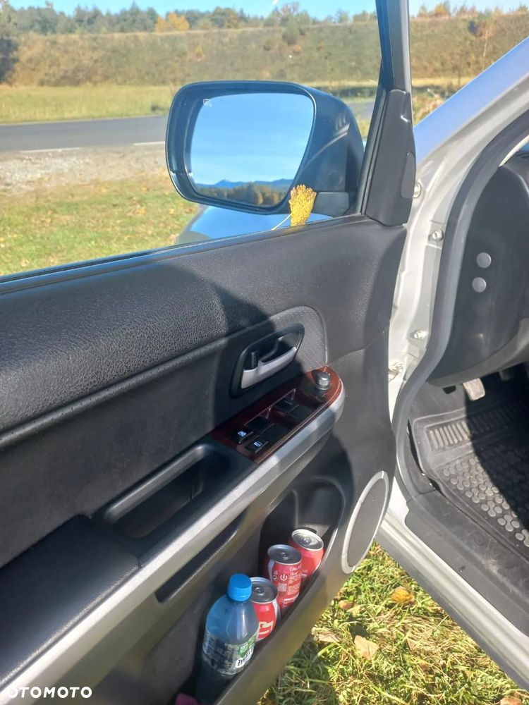 Suzuki Grand Vitara 2.0 - 9