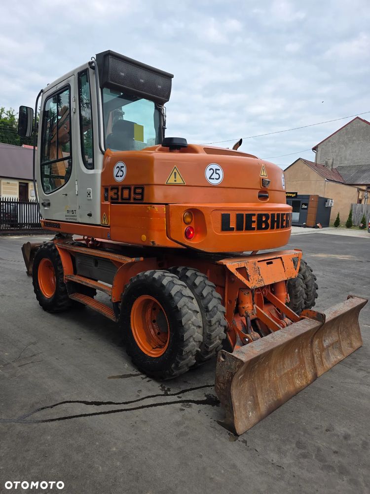Liebherr A309 Litronic - 7