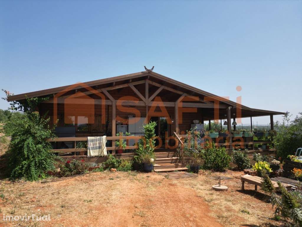 Terreno com casa de madeira e ruína em Algoz - Grande imagem: 5/52