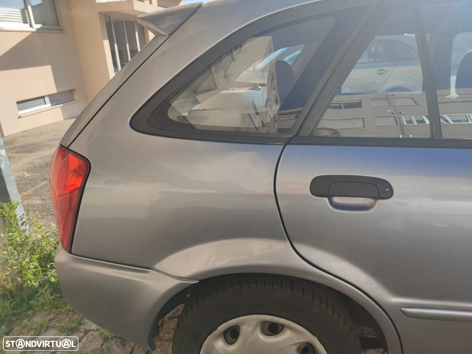 Mazda 323 - 12