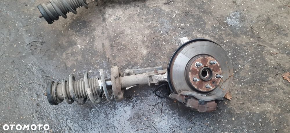 SERWO HAMULCA  - OPEL ASTRA J - 13338058 Astra j 1.4 turbo MacPherson 13354024 13354028 Amortyzator zwrotnica piasta  Kompletna noga - 13