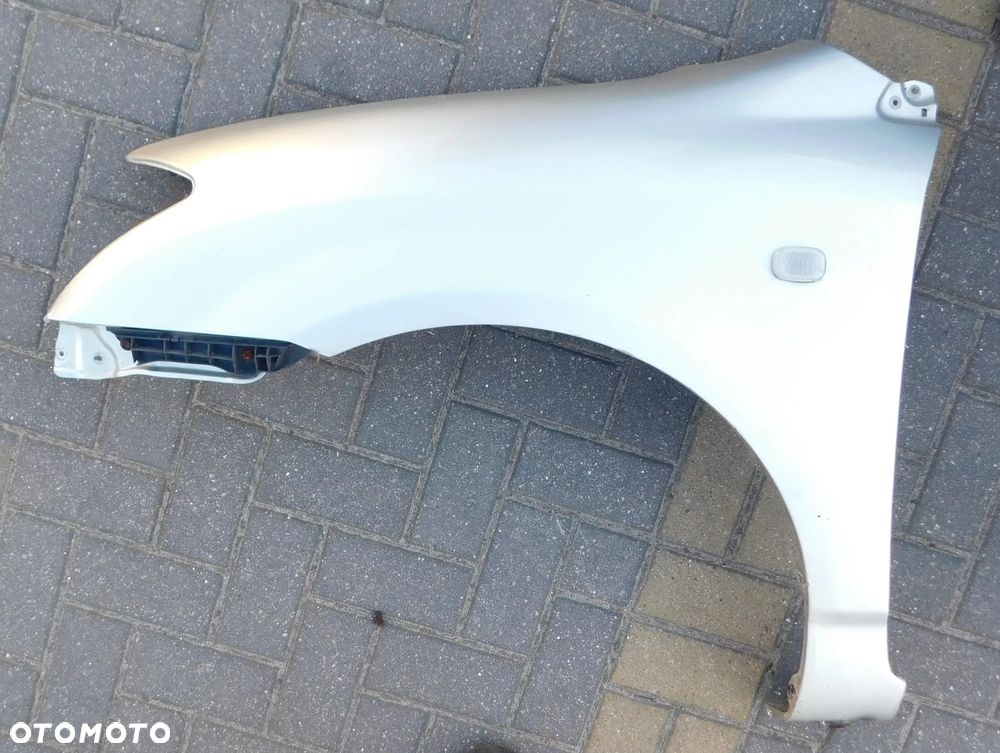 błotnik lewy przód TOYOTA COROLLA E12 HB  EU 1C0 - 1
