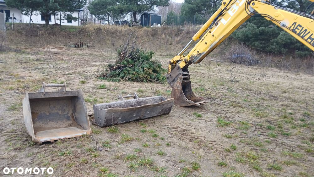 New Holland LB 115 - 13