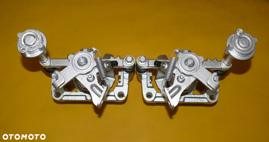 ZACISKI HAMULCOWE JARZMA LEWY PRAWY TYŁ OPEL ASTRA 4 IV J 292/12mm - 6