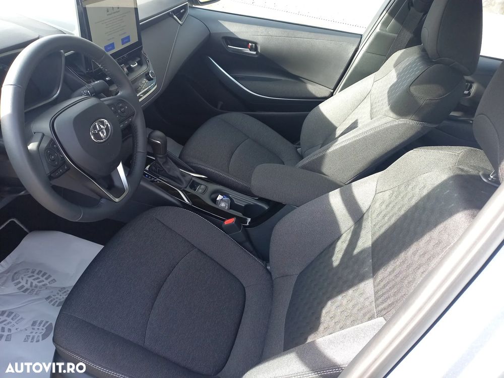 Toyota Corolla Sedan 1.8 HSD Business - 11