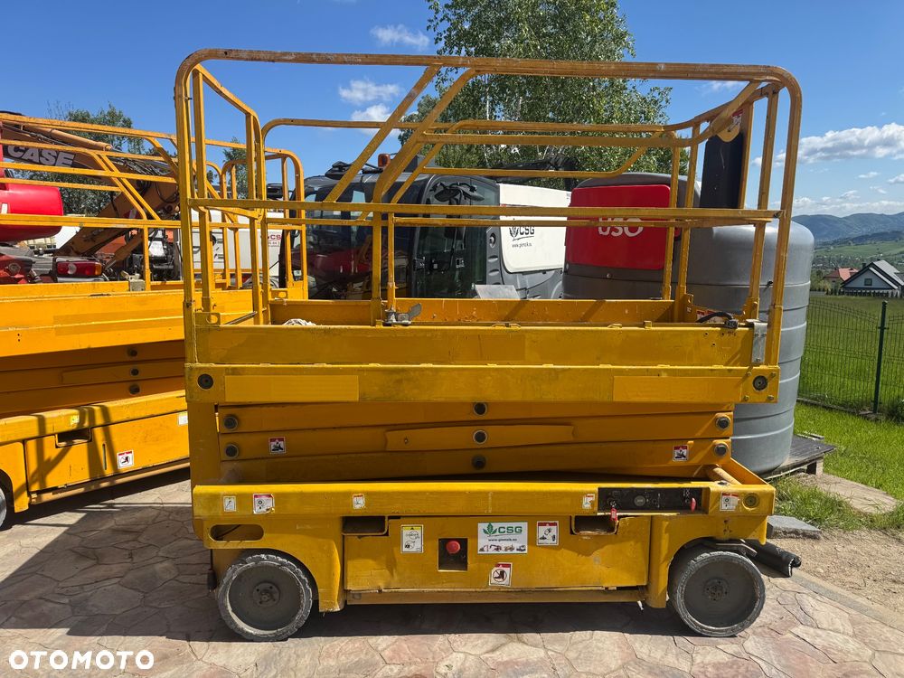 Haulotte Compact 10 10m podnośnik nożycowy zwyżka podest Genie