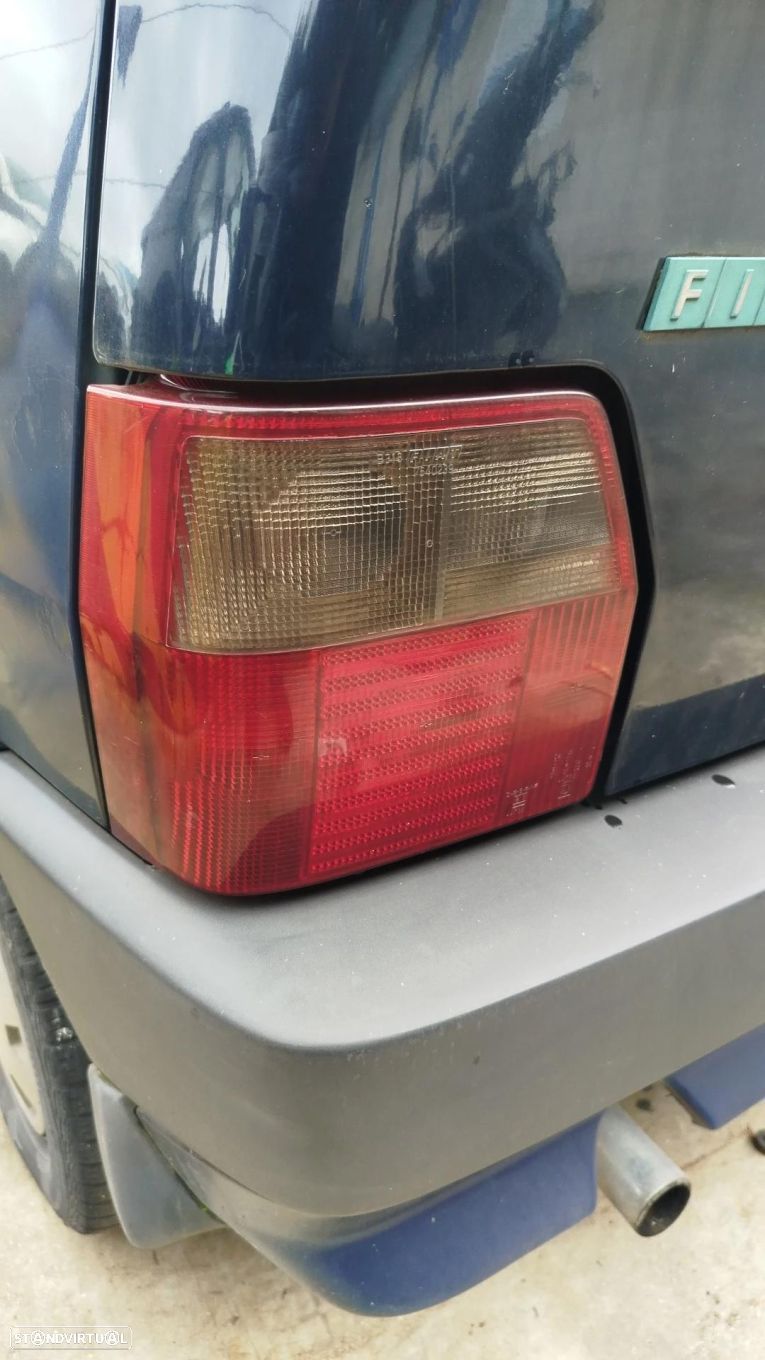 Farolim esquerdo FIAT Uno (146_) - 1