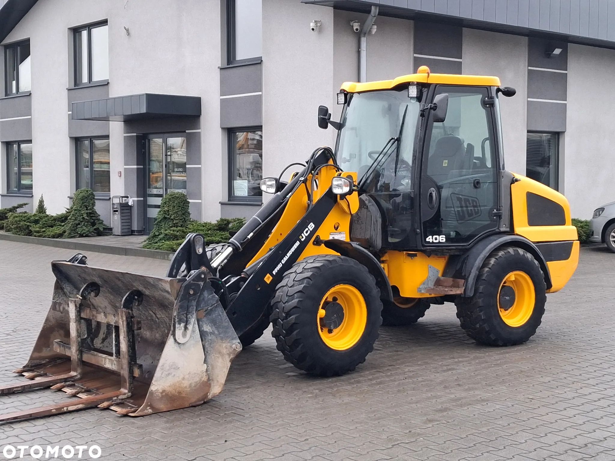 JCB 406 - 1