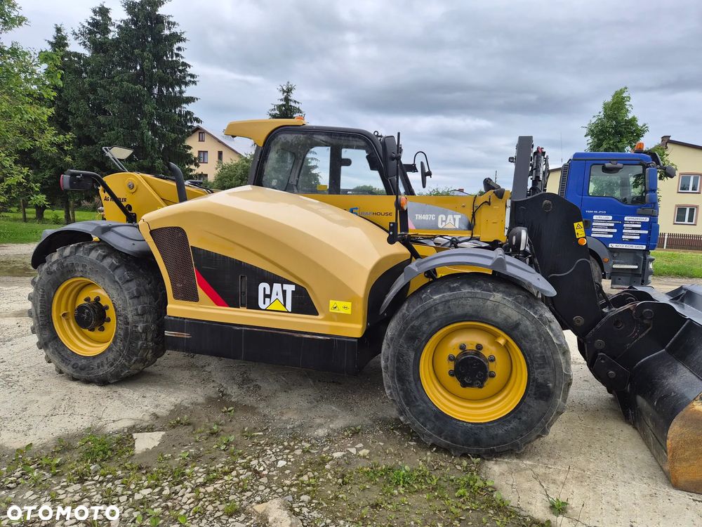 Caterpillar TH407C - 5