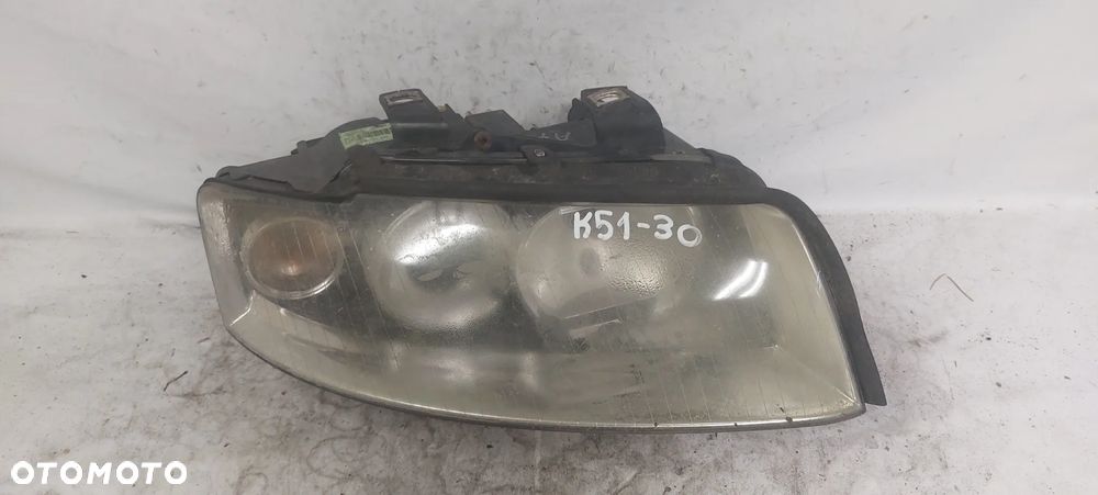 .  PRZOD PRZEDNIA LAMPA PRAWA AUDI A4 B6 - 1