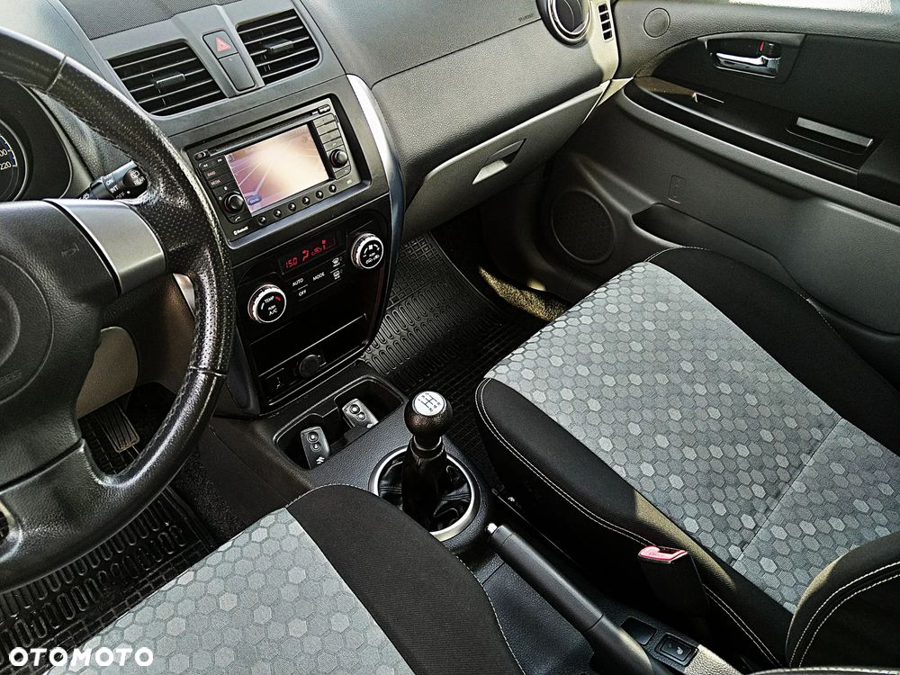 Suzuki SX4 1.6 Comfort Plus - 19