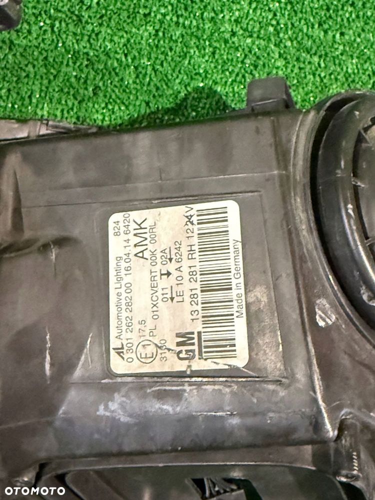 REFLEKTOR PRAWY OPEL ASTRA J GTC XENON NR:667 - 6