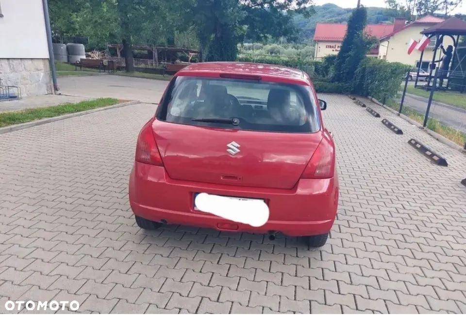 Suzuki Swift 1.3 Club - 4