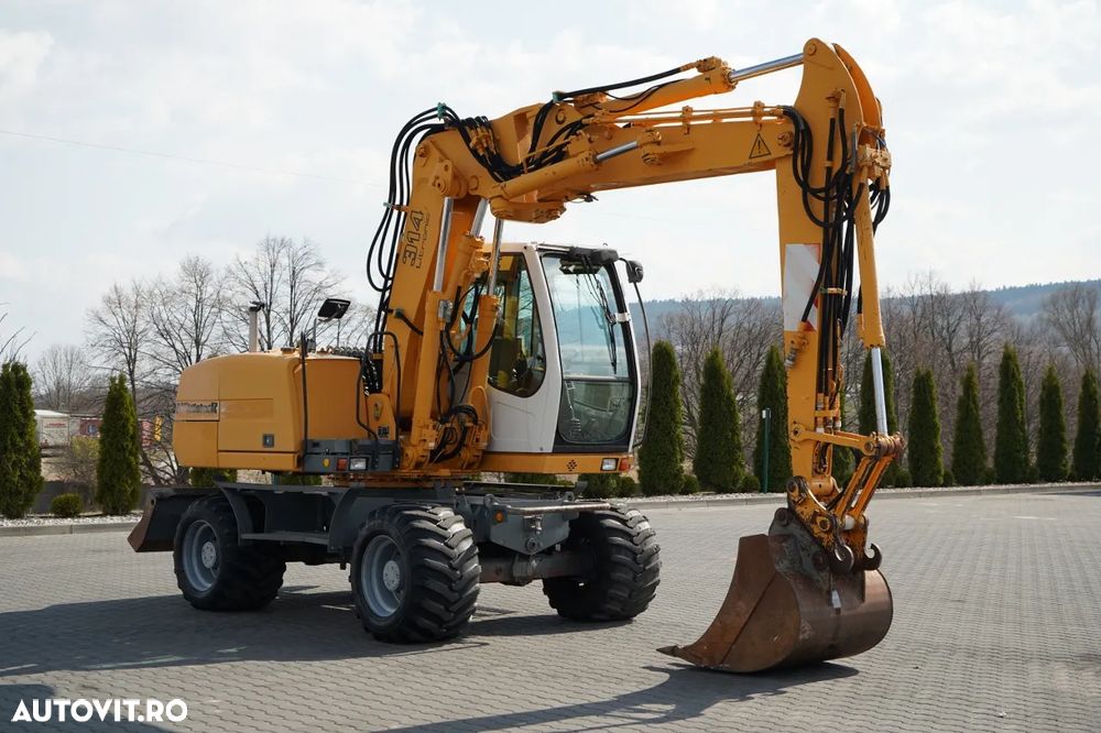 Liebherr A314 LITRONIC / EXCAVATOR PE ROȚI / AER CONDIȚIONAT / - 7