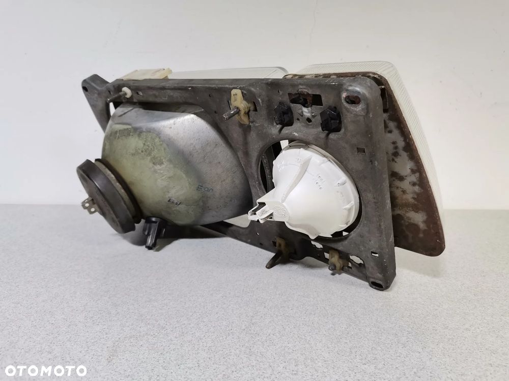Lampa Reflektor LEWY VOLKSWAGEN PASSAT B2 80-88 HELLA Oryginał - 7