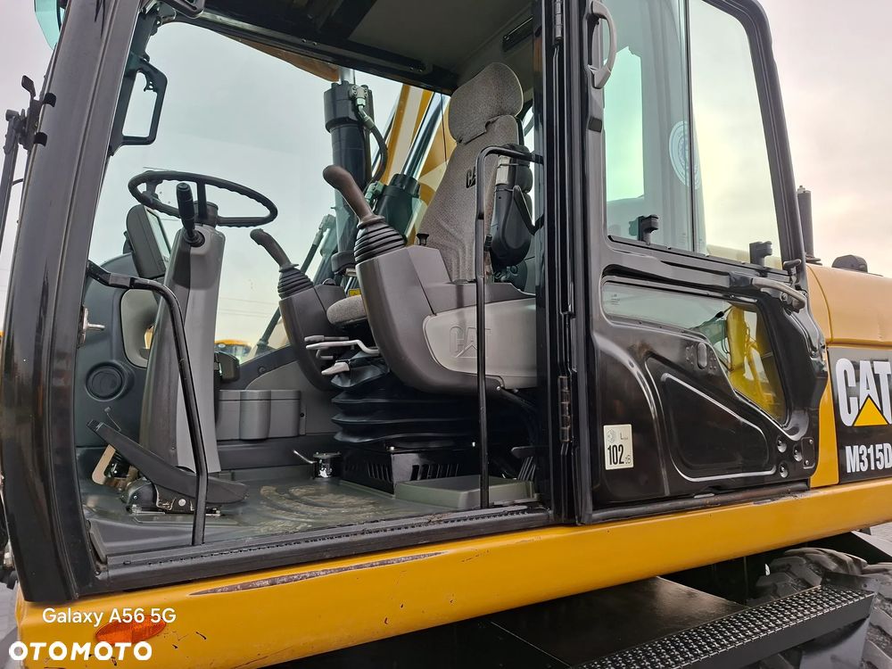 Caterpillar CAT M315D rok 2012 - 14