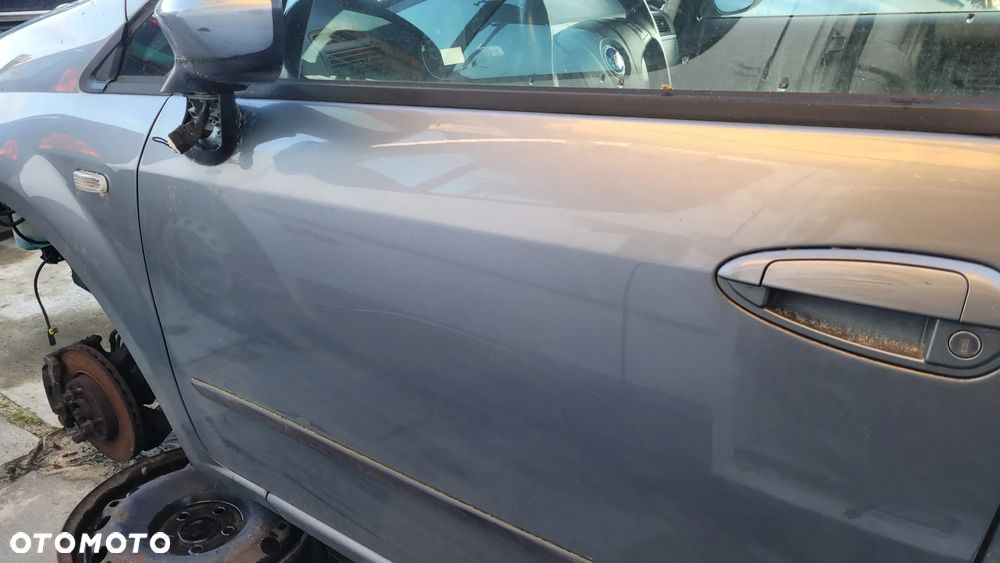 Drzwi lewe przód przednie FIAT GRANDE PUNTO 2008r 595A 595/A 5d hatchback - 2