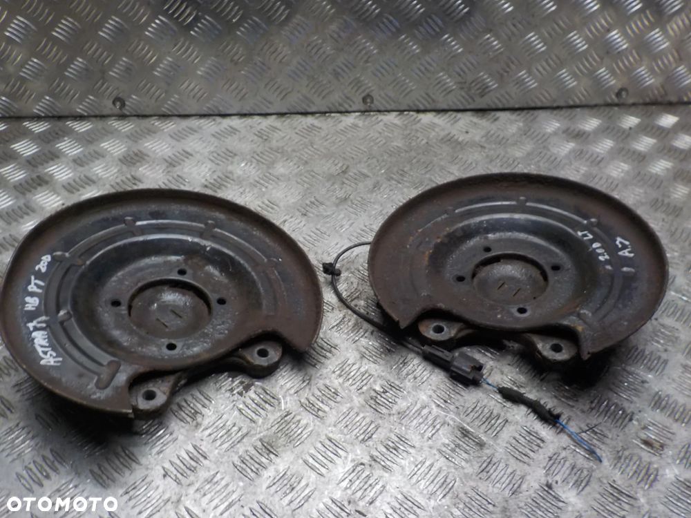 OPEL ASTRA J IV TARCZE KOTWICZNE OSŁONY TARCZY HAMULCOWEJ - 1