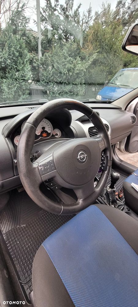 Opel Corsa 1.2 16V Catch me now - 34