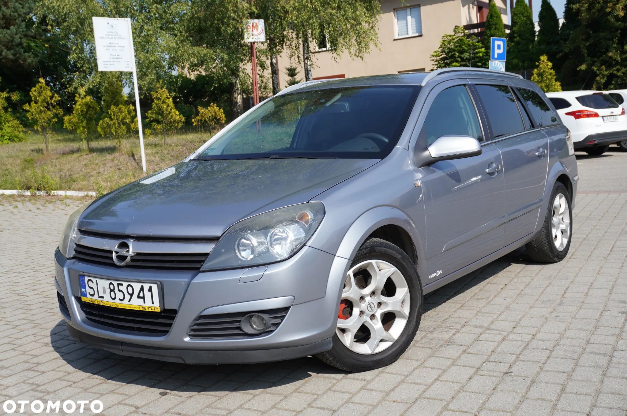 Opel Astra 1.8 Caravan Cosmo - 1