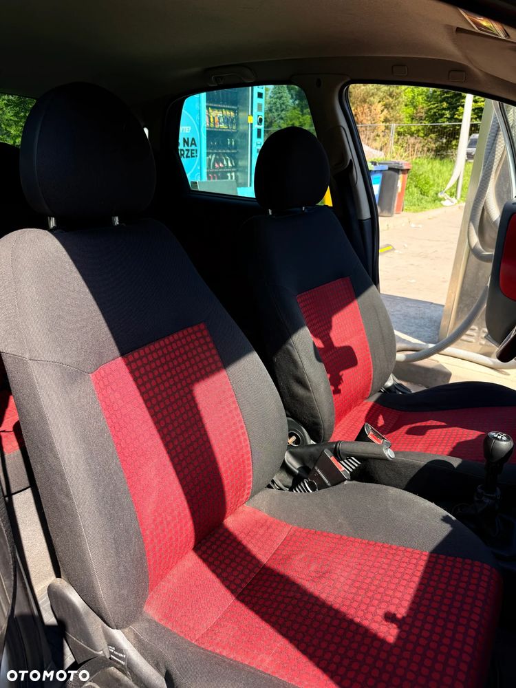 Opel Corsa 1.2 16V Cosmo - 7