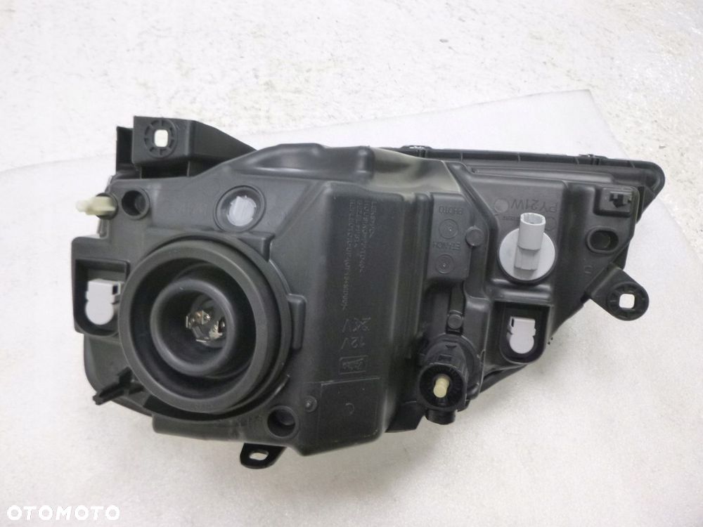 DACIA LOGAN 08-13 LAMPA PRAWY PRZÓDPRZEDNIA ORYGINAŁ - 13