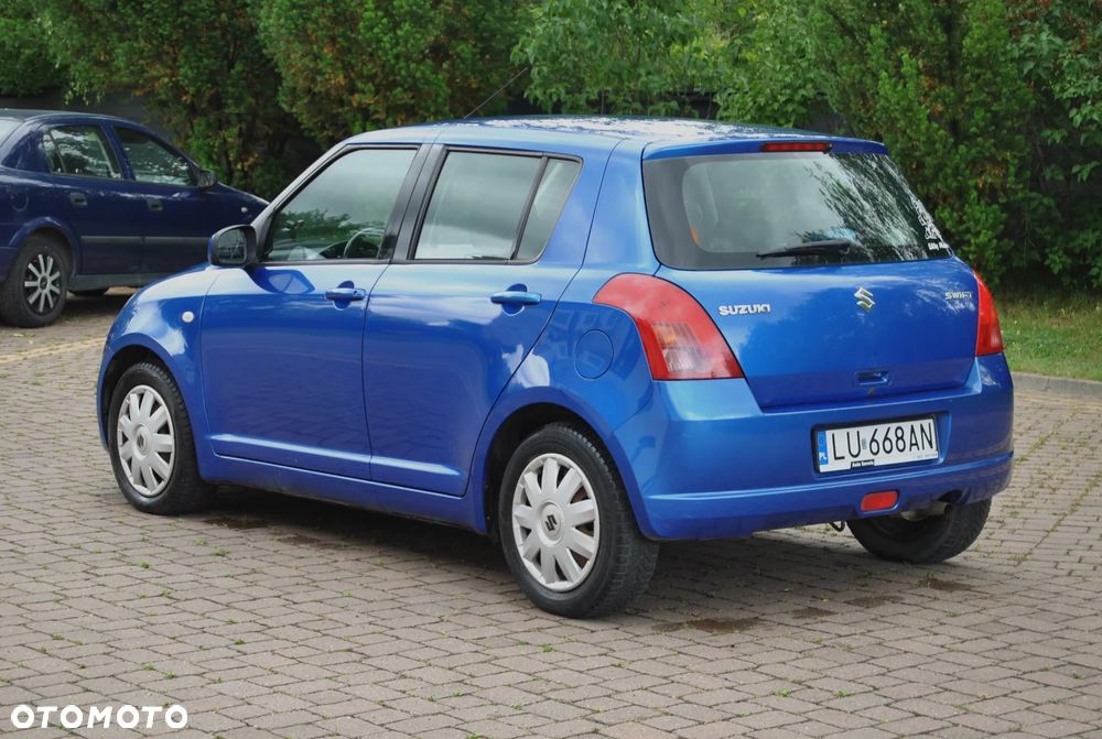 Suzuki Swift 1.3 Club - 4